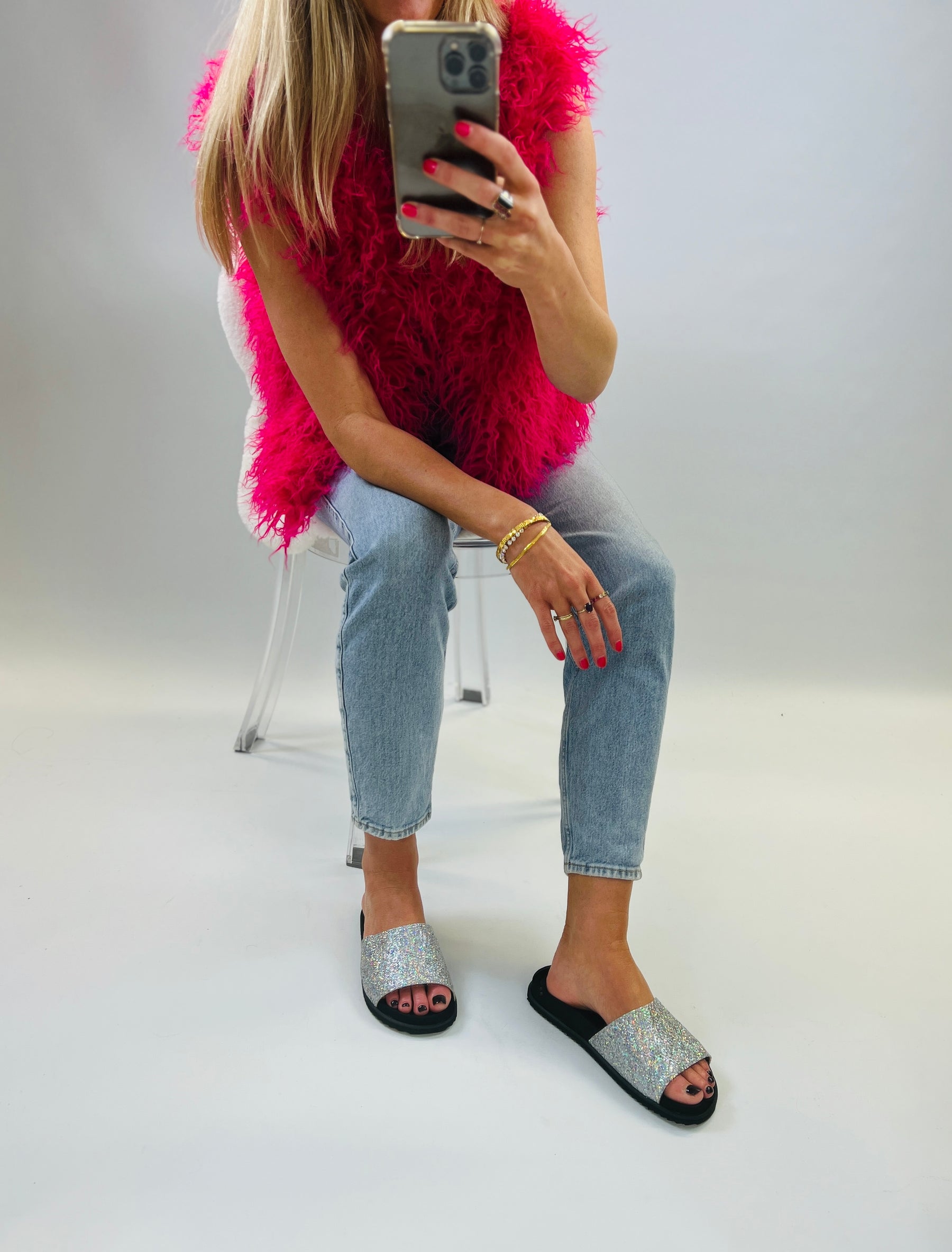 Slip on, silver sparkly sliders with an ergonomic microsuede innersole