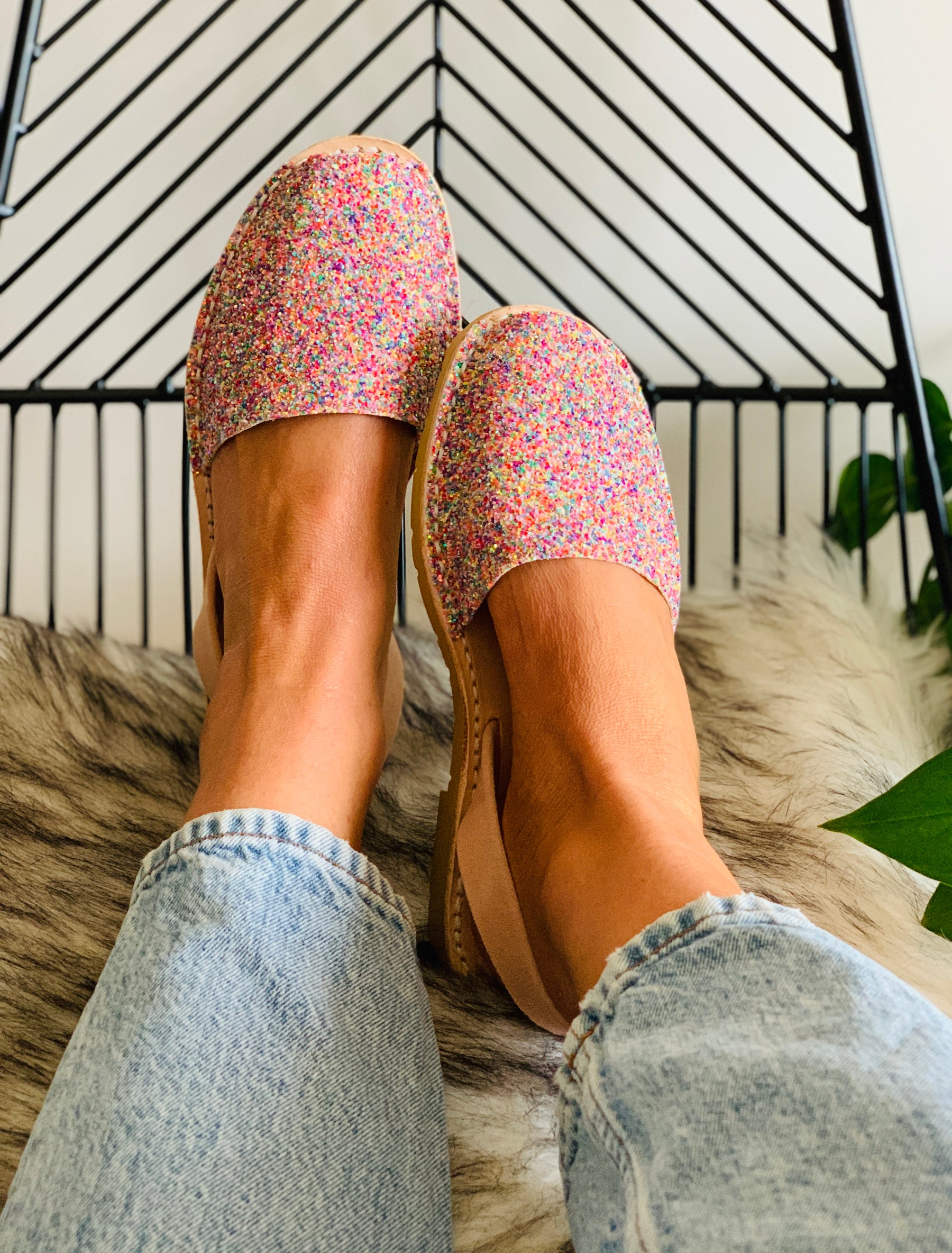 pastel multi coloured glitter upper on a traditional menorcan avarca sandal with neutral peach toned suede heelstrap and durable rubber sole.
