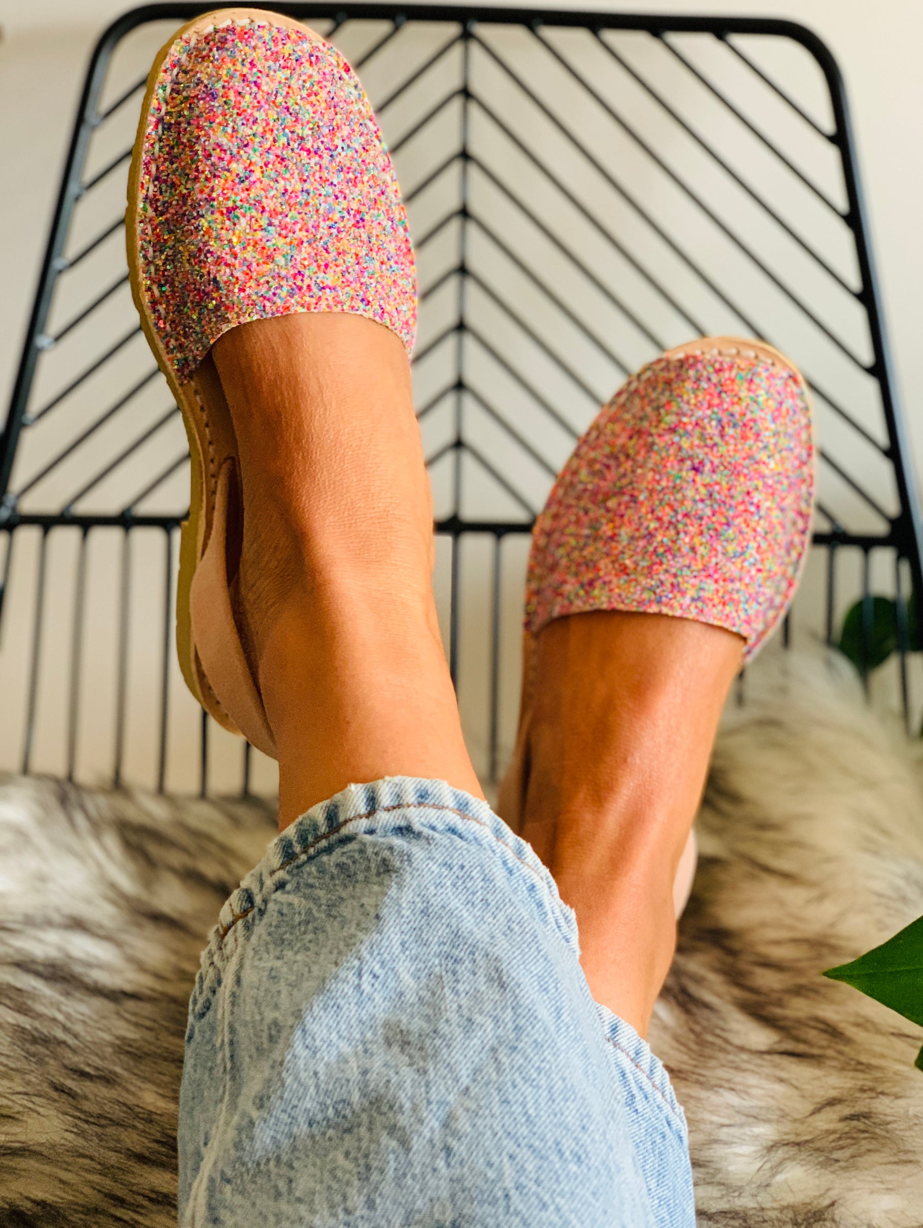 pastel multi coloured glitter upper on a traditional menorcan avarca sandal with neutral peach toned suede heelstrap and durable rubber sole.