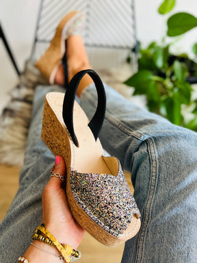 Black and Multi coloured glitter upper on an 8cm medium height lightweight cork wedge with black suede slingback heel strap