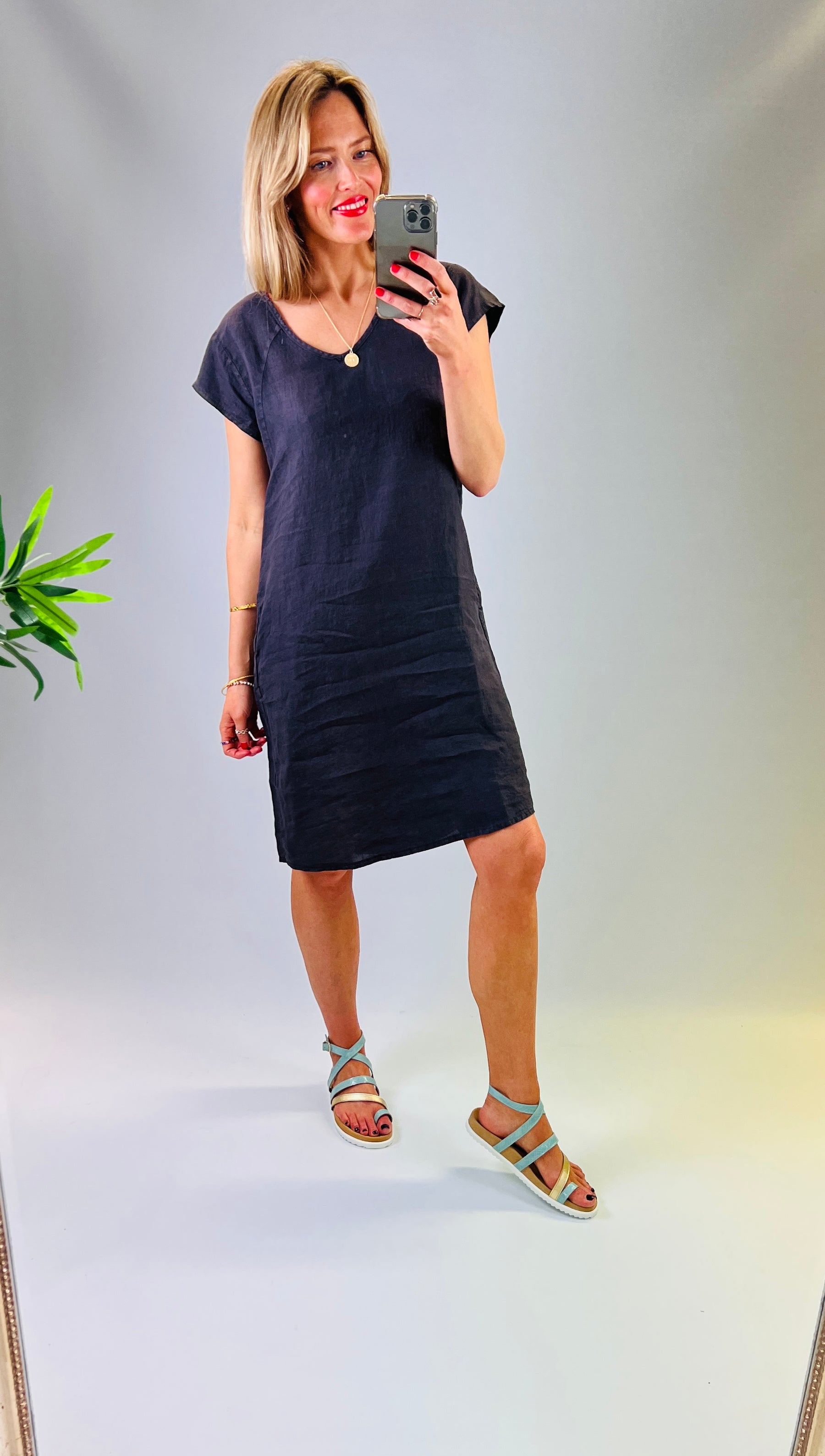 Classic linen slip-on dress, with stretch cotton back detail and pockets.