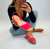 Neon coral and pink leather crossover avarca with backstrap, easy to wear slip-on summer sandals.