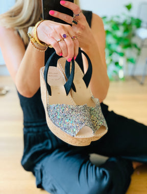 Black and Multi coloured glitter upper on an 8cm medium height lightweight cork wedge with black suede slingback heel strap