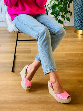 Bright bubblegum pink glitter upper on an 11cm high espadrille wedge with pink leather metallic slingback heel strap