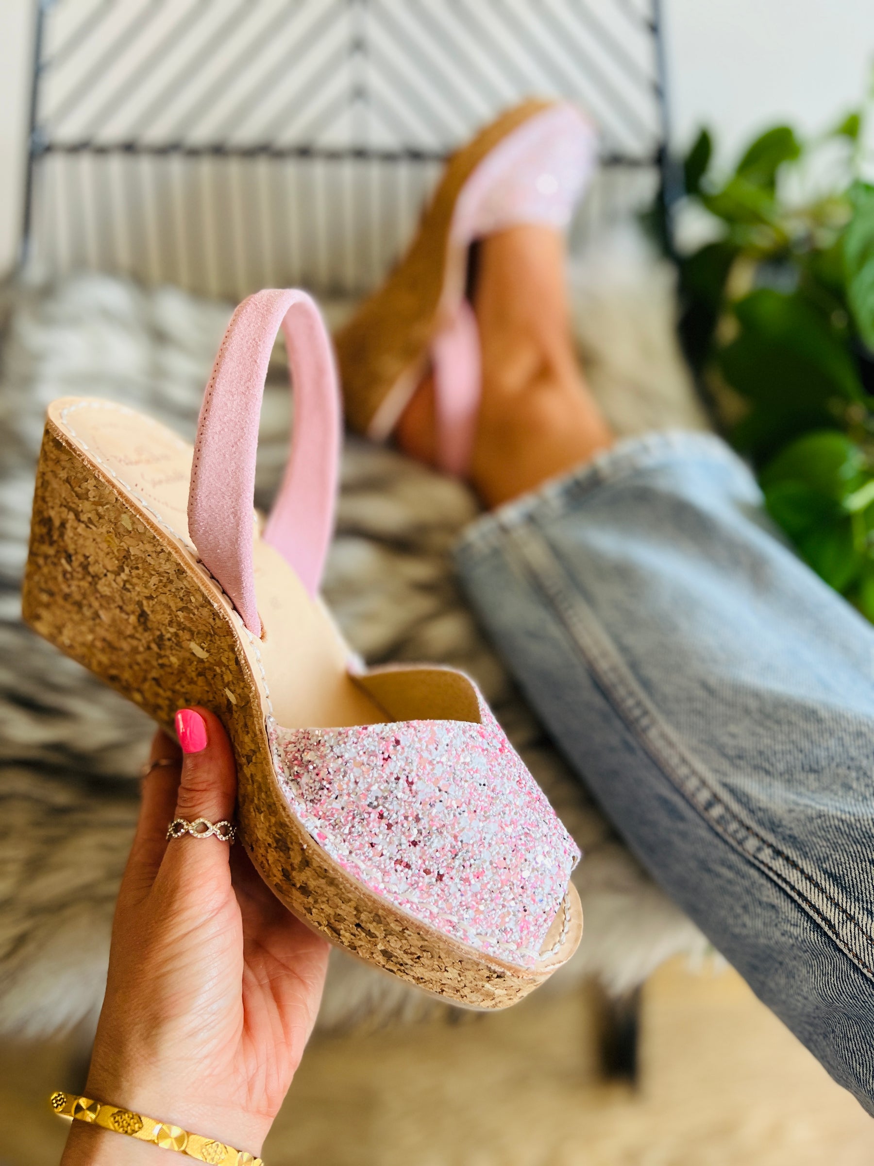 Pastel pink glitter mid height cork wedge in an menorcan avarca style with a pink suede heel strap